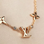 ¡®Loco¡¯STAR AND SUN 7 MOTIFS GOLD BRACELET